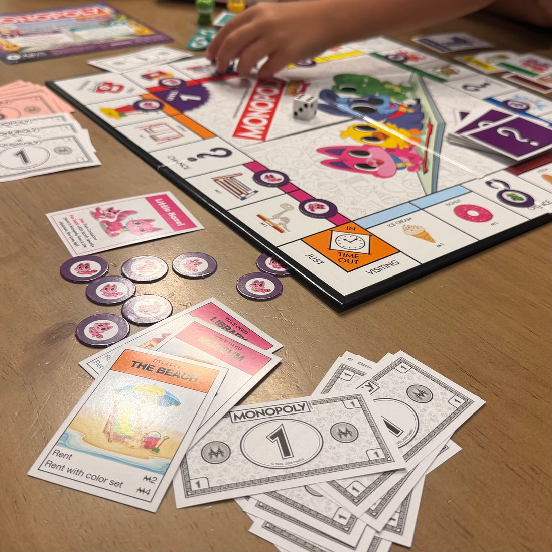 Monopoly Junior: Teaching Money Skills and Strategy Through Play