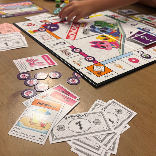 Monopoly Junior: Teaching Money Skills and Strategy Through Play