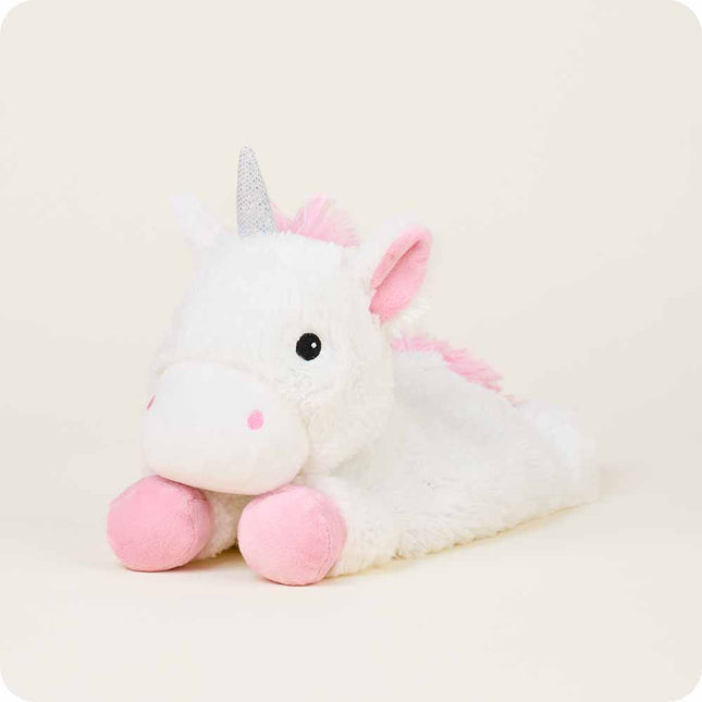 Laying down Unicorn Warmies